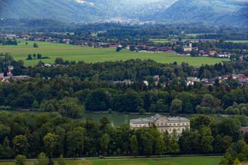 Wall Mural - The flat green fields and wooded areas around Salzburg and the Salzach river