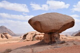 Fototapeta  - Huge rock that looks like a mushroom in the desert, Wadi Rum Dessert, Jordan