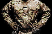 Soldier In Multi Camouflaged Tunic Clothing And Tactical Belt Standing On Black Background.