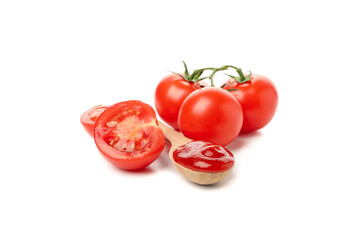 Wall Mural - Tomatoes and spoon with sauce isolated on white background