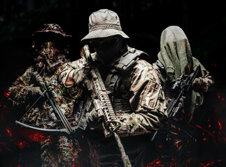 Wall Mural - Shaded camouflaged soldiers in uniform standing with weapons.