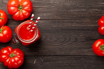 Wall Mural - Fresh tomato juice and ripe tomatoes