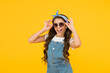 © be free - Enjoying new great day. happy childrens day. cheerful vintage girl on yellow background. little beauty at hairdresser. love her retro fashion style. summer vacation. summer shopping sales. pin up kid