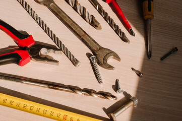 Set of vintage hand construction and carpentry tools hammers on a old wooden background, retro concept