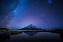 Night Sky Over Mt. Taranaki Reflecting In Pouakai Pool, New Zealand