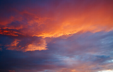 Poster - Unbelievable colorful sunset with red scenic clouds.