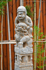 Ancient Chinese figures and lion stone sculptures