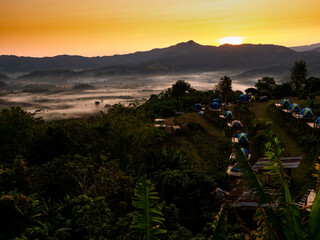 Wall Mural - Sunset of The Mountain before Morning with The Fog on The Ground