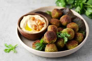 Wall Mural - Hummus plate with falafel. Middle Eastern traditional appetiser. Authentic arab cuisine