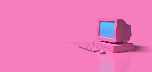 Vintage old computer desktop on pink background