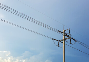 electric pole with blue sky background , Ideal for use in the design fairly.