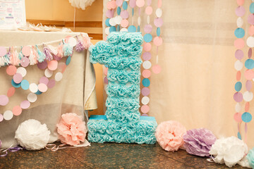 Wall Mural - girl's first birthday decorations. party for little girl. number one on background of beautiful deco