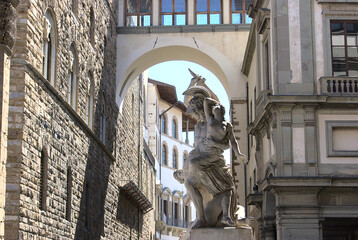 Wall Mural - Florence, Italy - May 5 2019: a marble sculpture in Loggia dei Lanzi, in Piazza della Signoria 