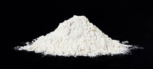 A Pile Of Flour Isolated On Black Background. Full Depth Of Field.