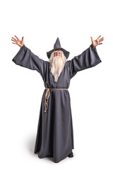 Wall Mural - A stern grey-haired bearded wizard in a gray cassock and a cap is practicing sorcery and doing magic against a light background.