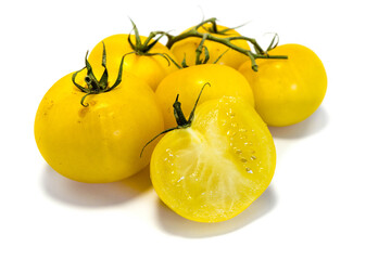 Wall Mural - Yellow tomatoes isolated on white