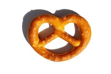 Large pretzel with a hard shadow isolated on a white background.