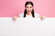 © deagreez - Portrait of her she nice attractive lovely charming glad amazed cheerful cheery girl showing copy empty blank space board promotion presentation isolated over pink pastel color background