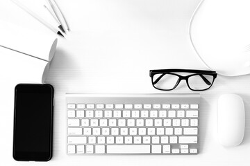 Black and white picture - The work equipment of the engineer placed on the table