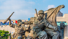 Statue Of Soliders In Front Of The War Memorial Of Korea In Seoul, Republic Of Korea