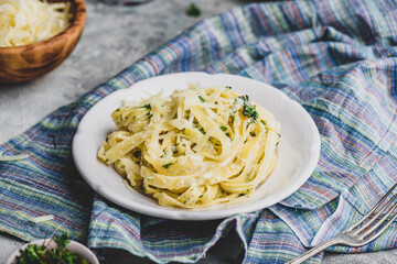 Portion of Homemade Fettuccine with Alfredo Sauce