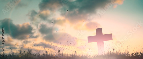 Fotomural Silhouette jesus christ crucifix on cross on calvary sunset background concept f
