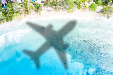 Wall Mural - Travel traveling symbolic picture vacation sea airplane flying Seychelles beach