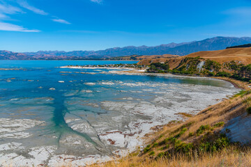 Wall Mural - Aerial view of a fishing village at South bay in Kaikoura, New Zealand