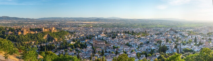 Sunset view of Alhambra palace and el Salvador church in Granada, Spain