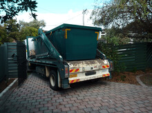 Skip Hired Being Delivered On A Truck