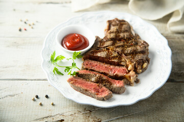 Canvas Print - Grilled beef steak with tomato sauce