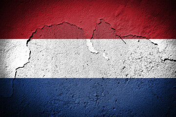 Netherlands flag on cracked wall