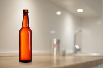 Wall Mural - Brown beer bottle on kitchen table. Mock-up design presentation.