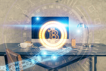 Double exposure of blockchain and crypto economy theme hologram and table with computer background. Concept of bitcoin cryptocurrency.