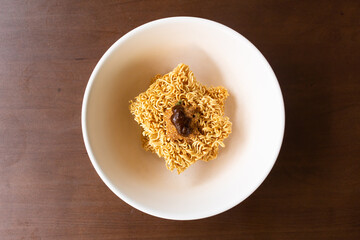 Top view of the instant noodle and flavoring