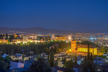 Night view of Alhambra palace and el Salvador church in Granada, Spain