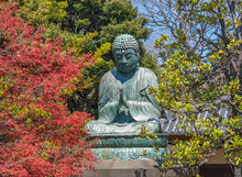 Giant Bronze Statue Depicting The Buddha Shaka Nyorai In The Tendai Buddhism Tennoji Temple In The Yanaka Cemetery Of Tokyo.