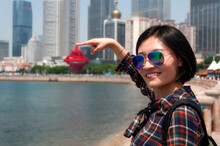 Chinese Woman With Fushan Bay Qingdao China Blurred Background