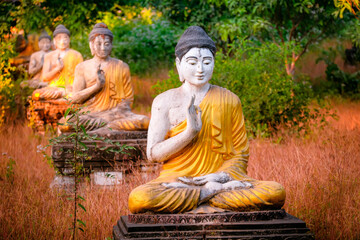 Wall Mural - Lot Buddhas statues in Loumani Buddha Garden. Hpa-An, Myanmar (Burma)