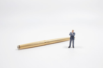 a Business man with the golden pen.