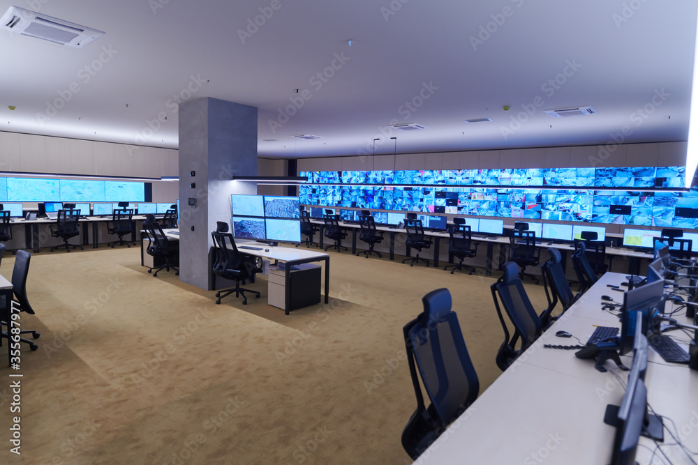 Empty interior of big modern security system control room - obrazy, fototapety, plakaty 