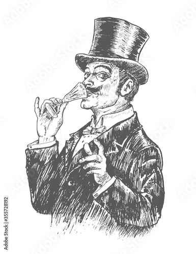 Fotografía Elegant gentleman in top hat holding a glass of alcohol drink
