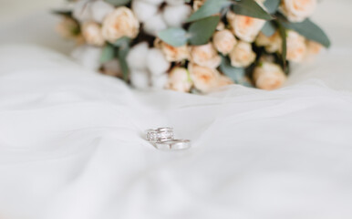 wedding rings on a bouquet