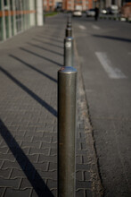 Small Iron Posts Along The Road