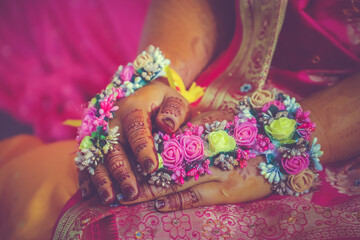 Indian Hindu Pre wedding Haldi ceremony hands and feet decorations close up