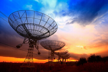 Wall Mural - the silhouette of a radio telescope observatory