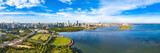 Fototapeta Miasta - Haikou City Skyline in the Binhai Avenue Central Business District with Office Buildings and Evergreen Park View, Hainan Province, The Largest Pilot Free Trade Zone in China, Asia. Panorama View.