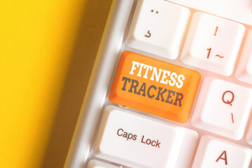 Poster - Writing note showing Fitness Tracker. Business concept for a monitoring device that records any healthrelated activity