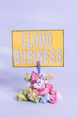 Poster - Text sign showing Cloud Business. Business photo showcasing internetbased delivery of services made available to users Reminder pile colored crumpled paper clothespin reminder blue background