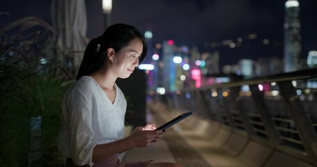 Sticker - Woman use of tablet computer at night